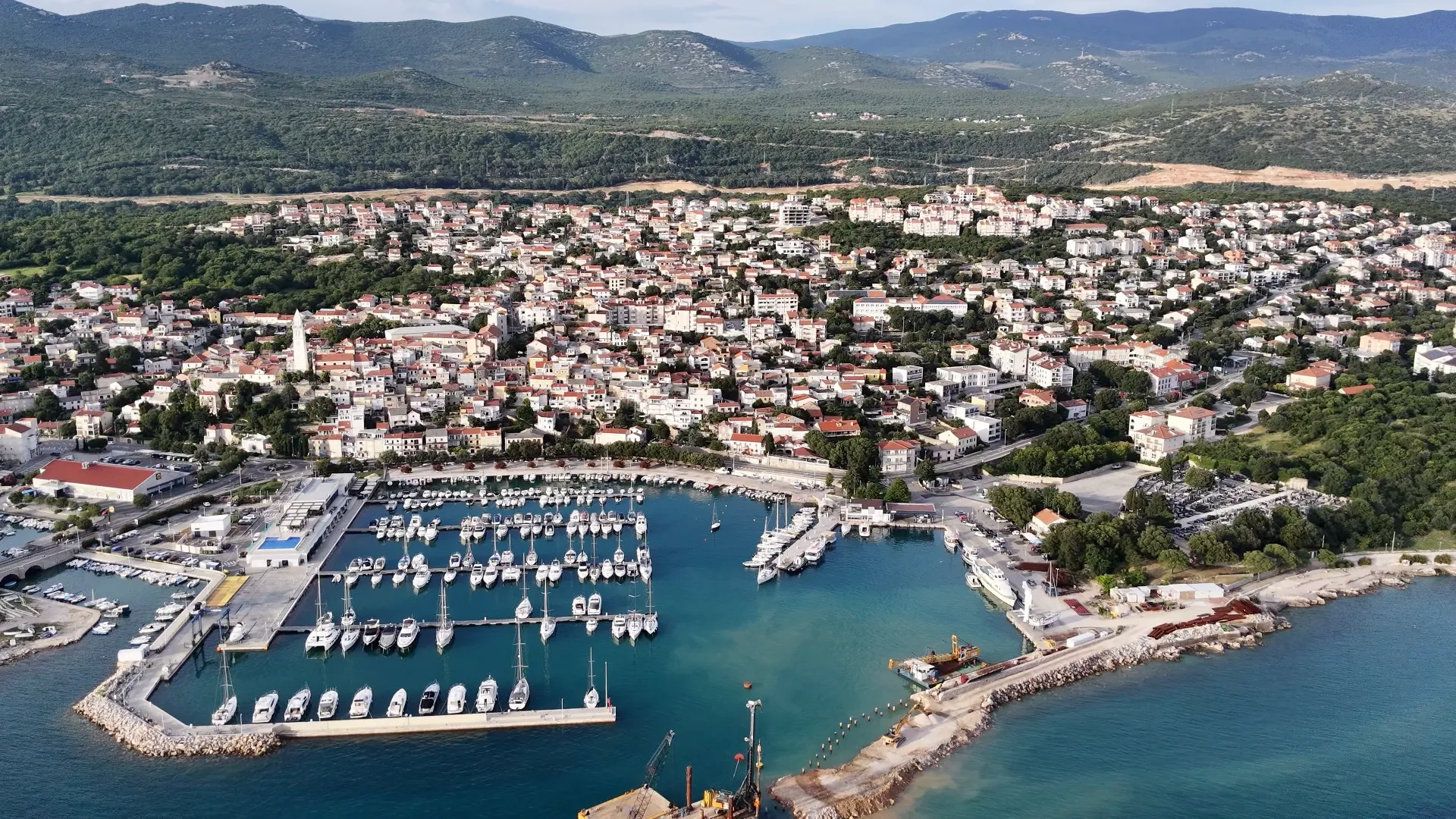 Aerial panorama of Novi Vinodolski old town, marina and coastline