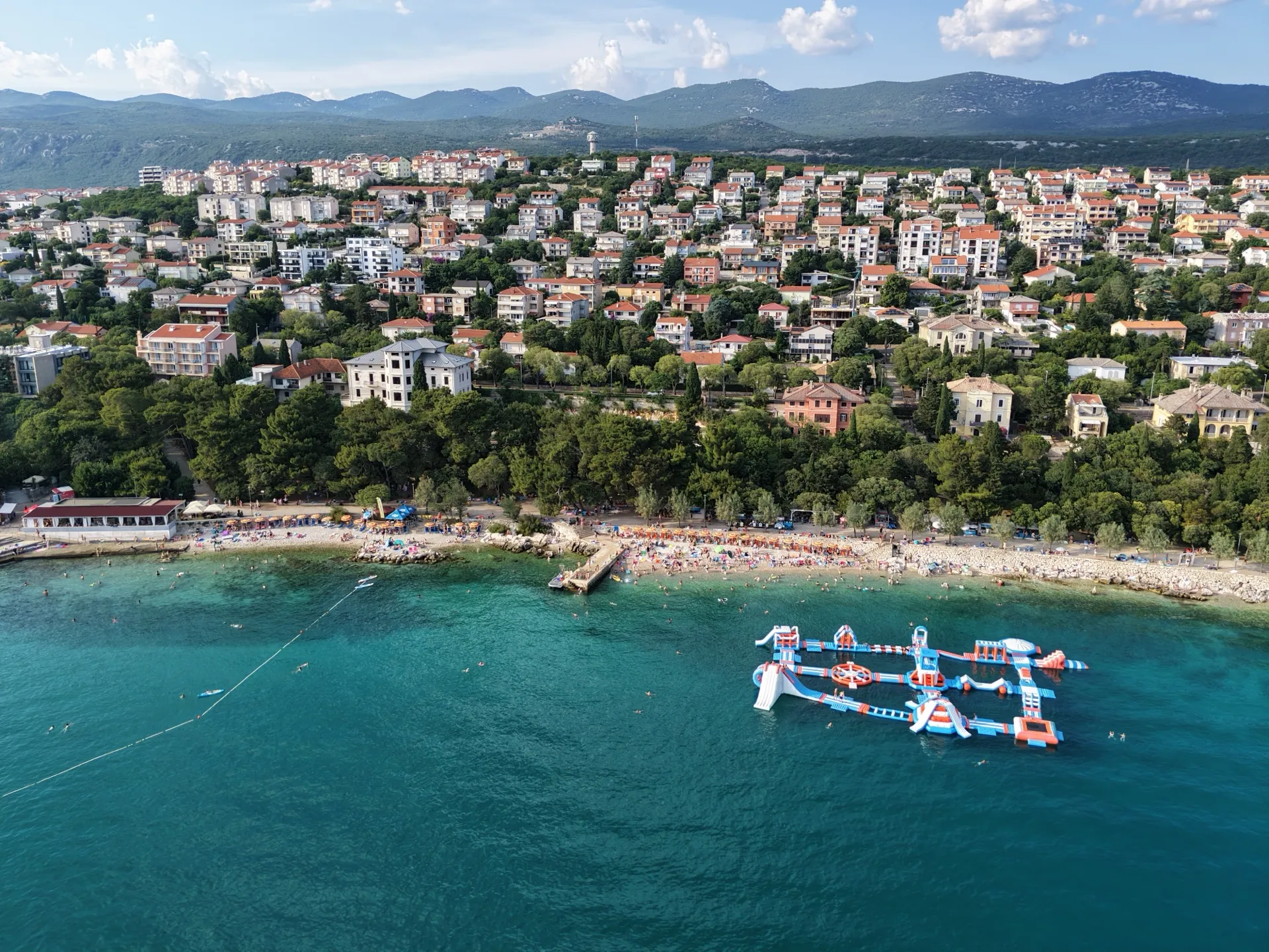 Aerial view of Lišanj Beach and the inflatable water park in Novi Vinodolski