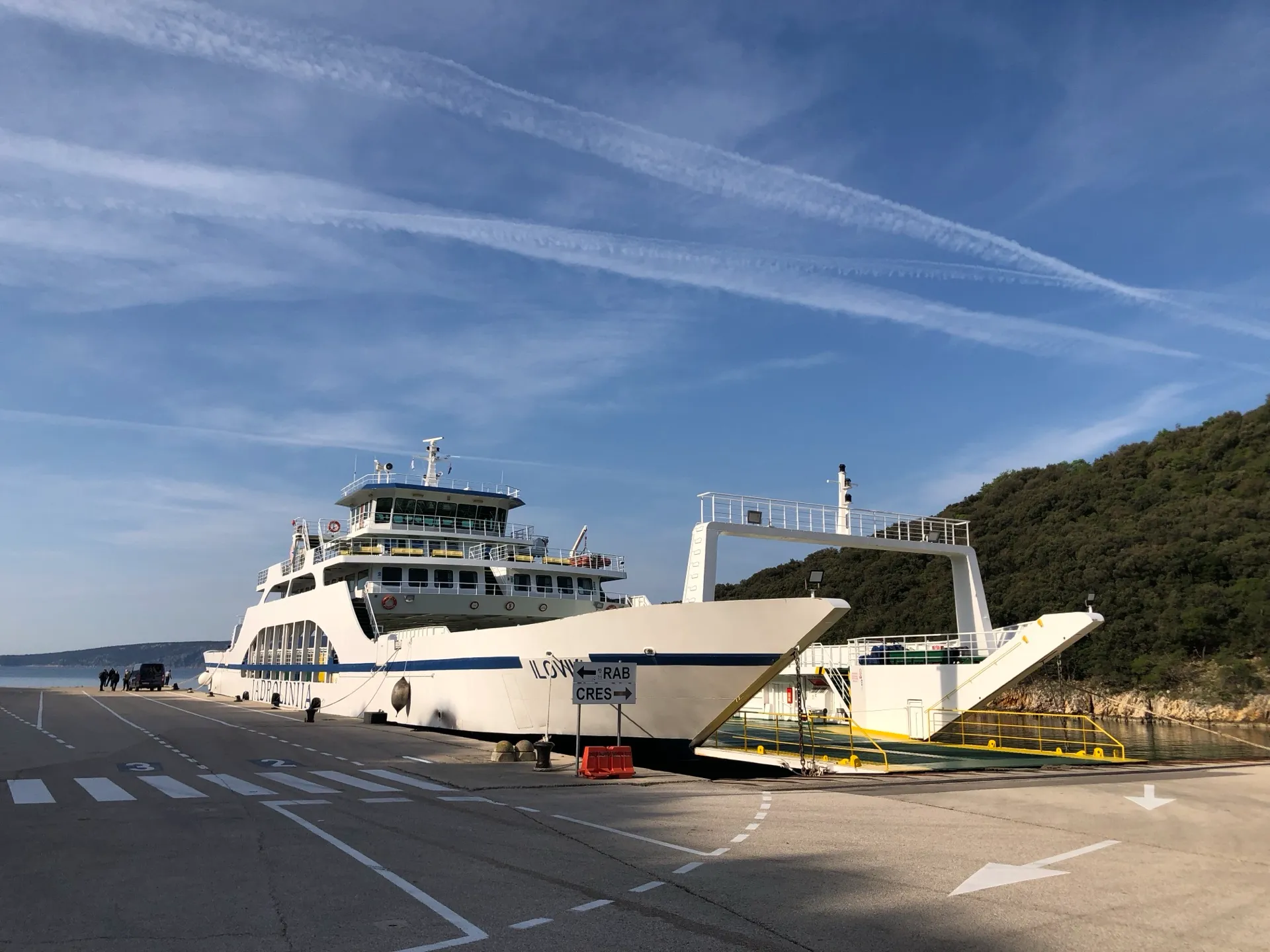 Car ferry and Cres direction sign at Valbiska port on Krk