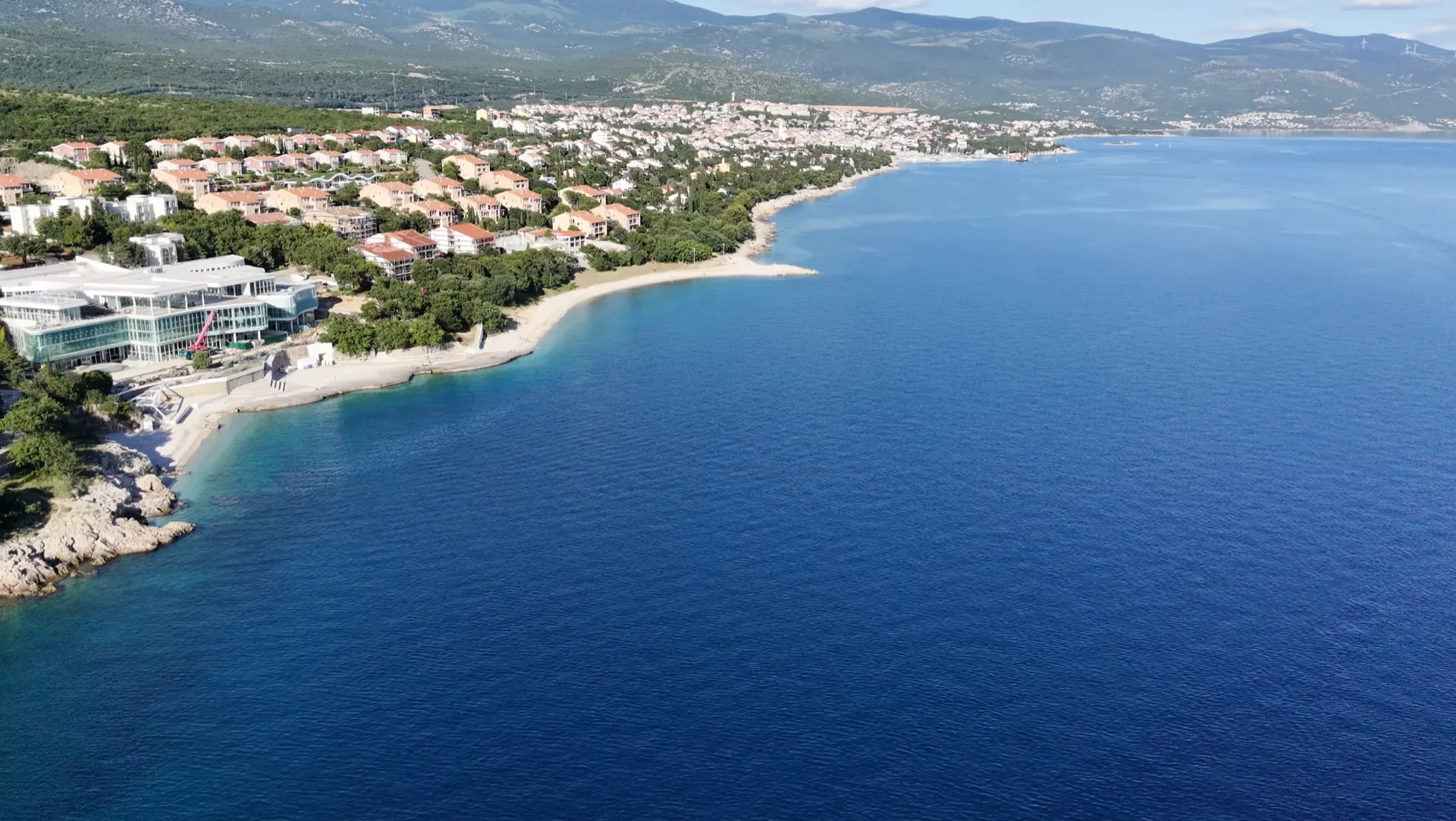 Wide aerial view of Obala Petra Krešimira IV and the Novi Vinodolski coastline