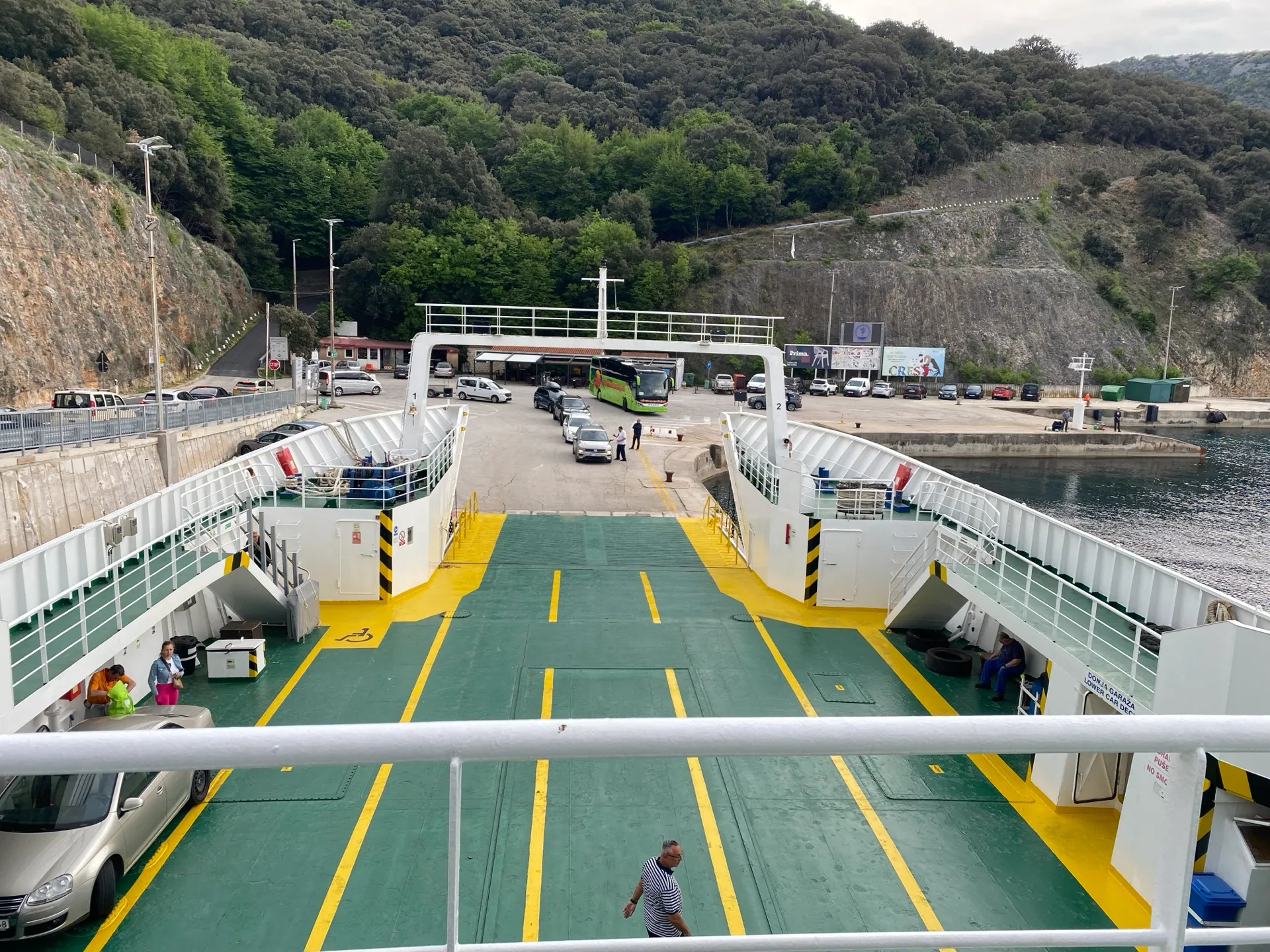 Vehicles leaving the ferry terminal at Merag on Cres