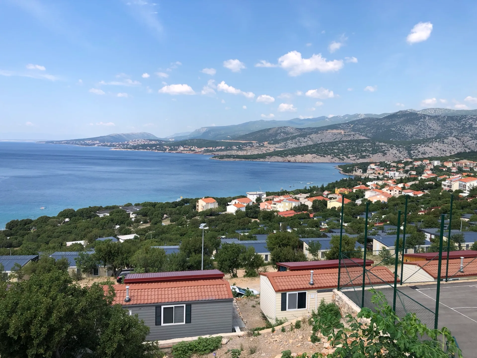 Klenovica coast, village and rocky mountains on a clear day