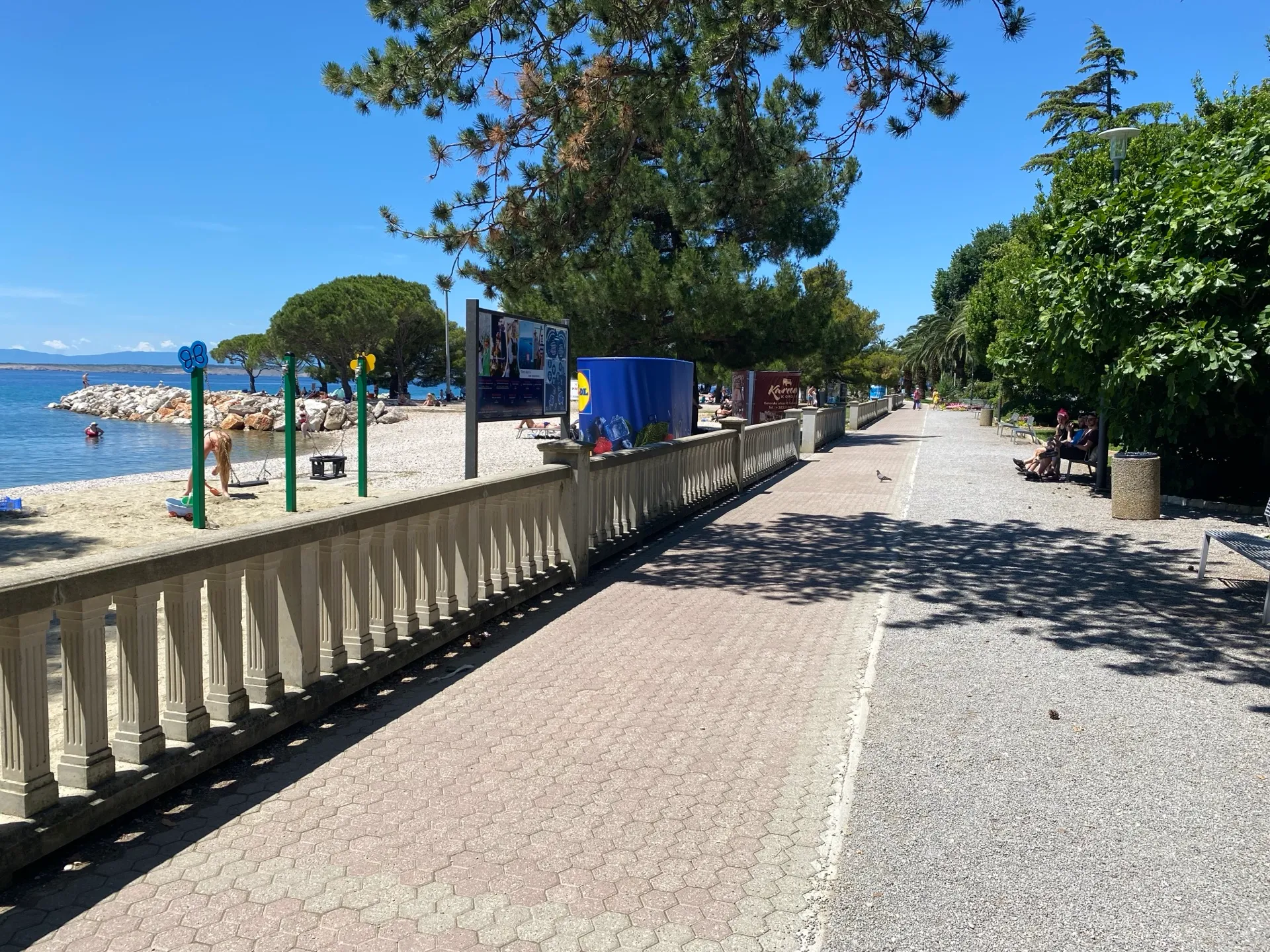 Beach promenade beside a pebble cove in Crikvenica