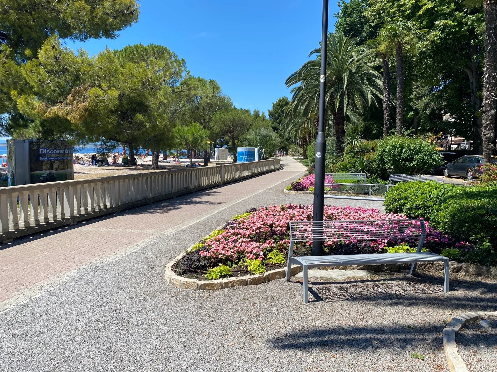 Flower gardens and palms along the Crikvenica promenade