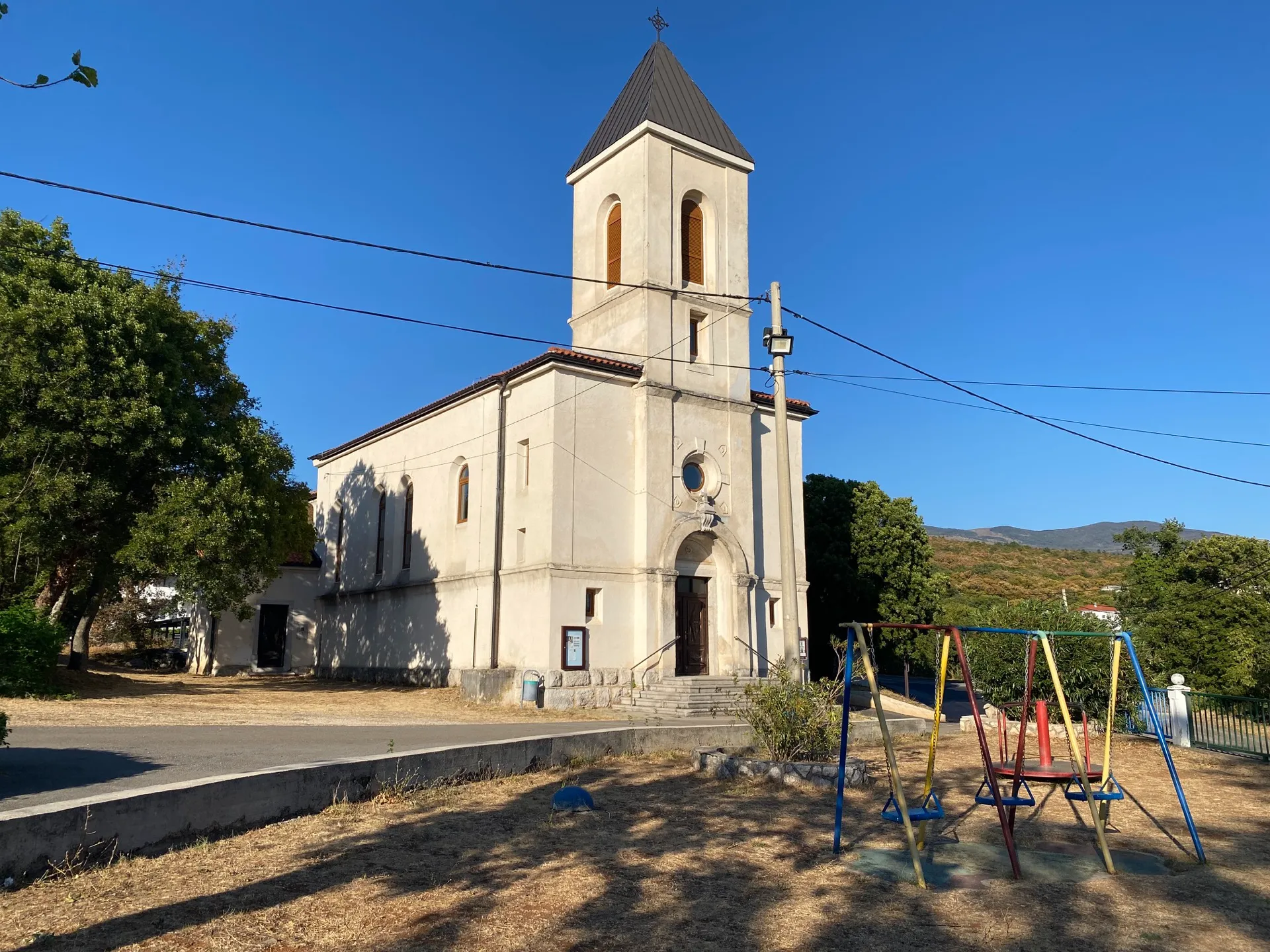 St Anthony’s Church and the community playground in Donji Zagon