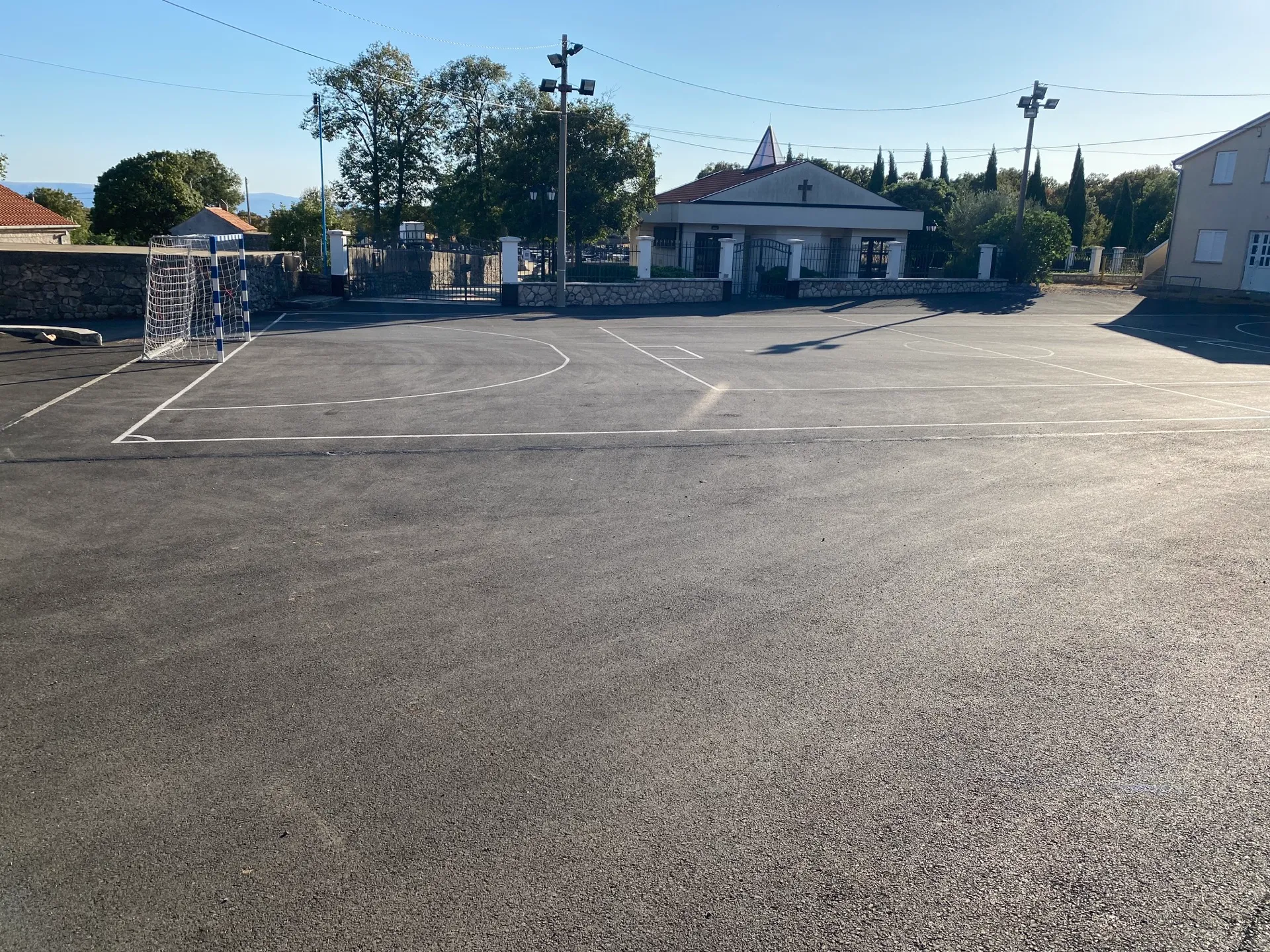 Quiet community square beside St Anthony’s Church in Donji Zagon