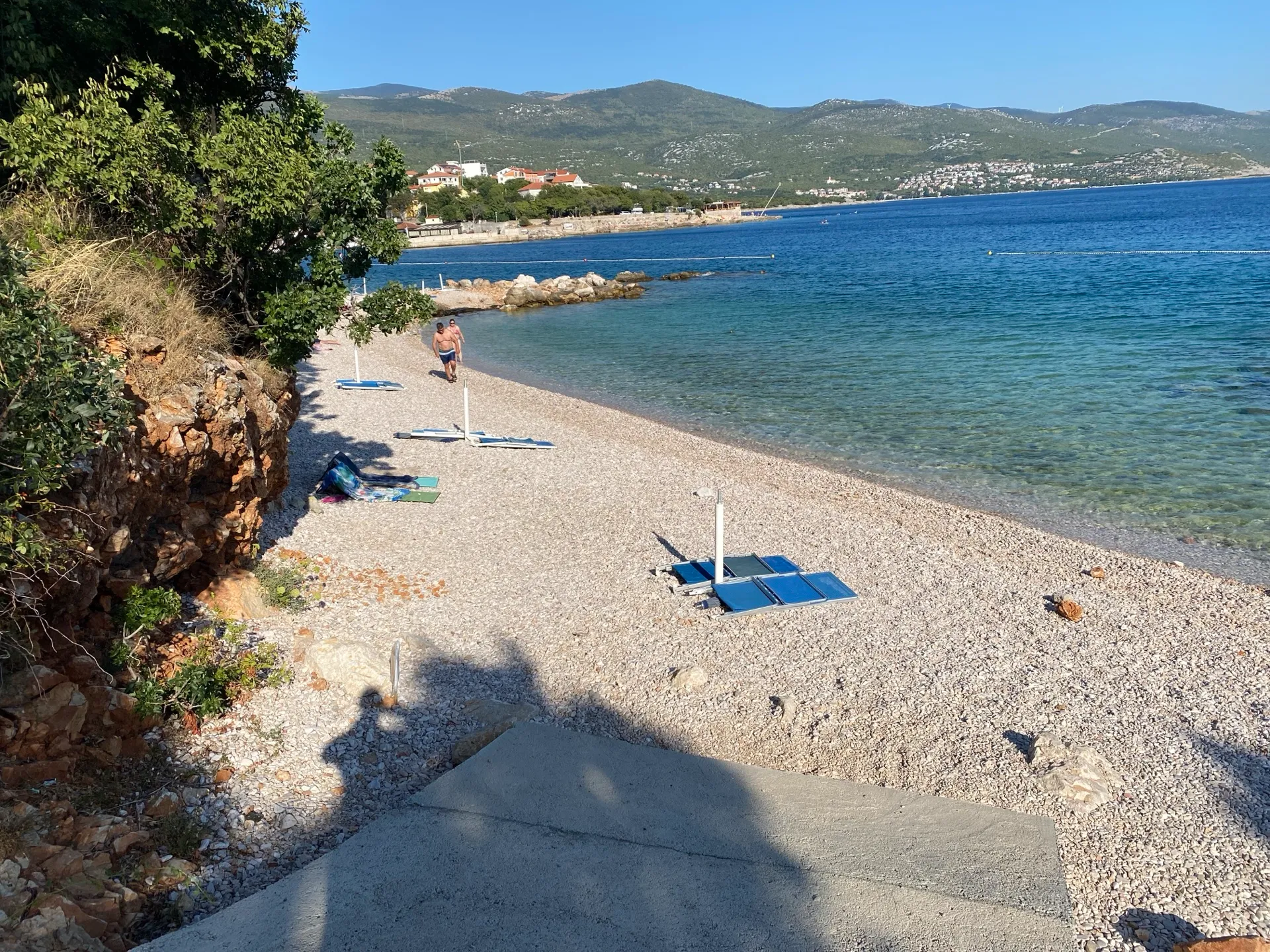Pebble beach with clear Adriatic water in Povile