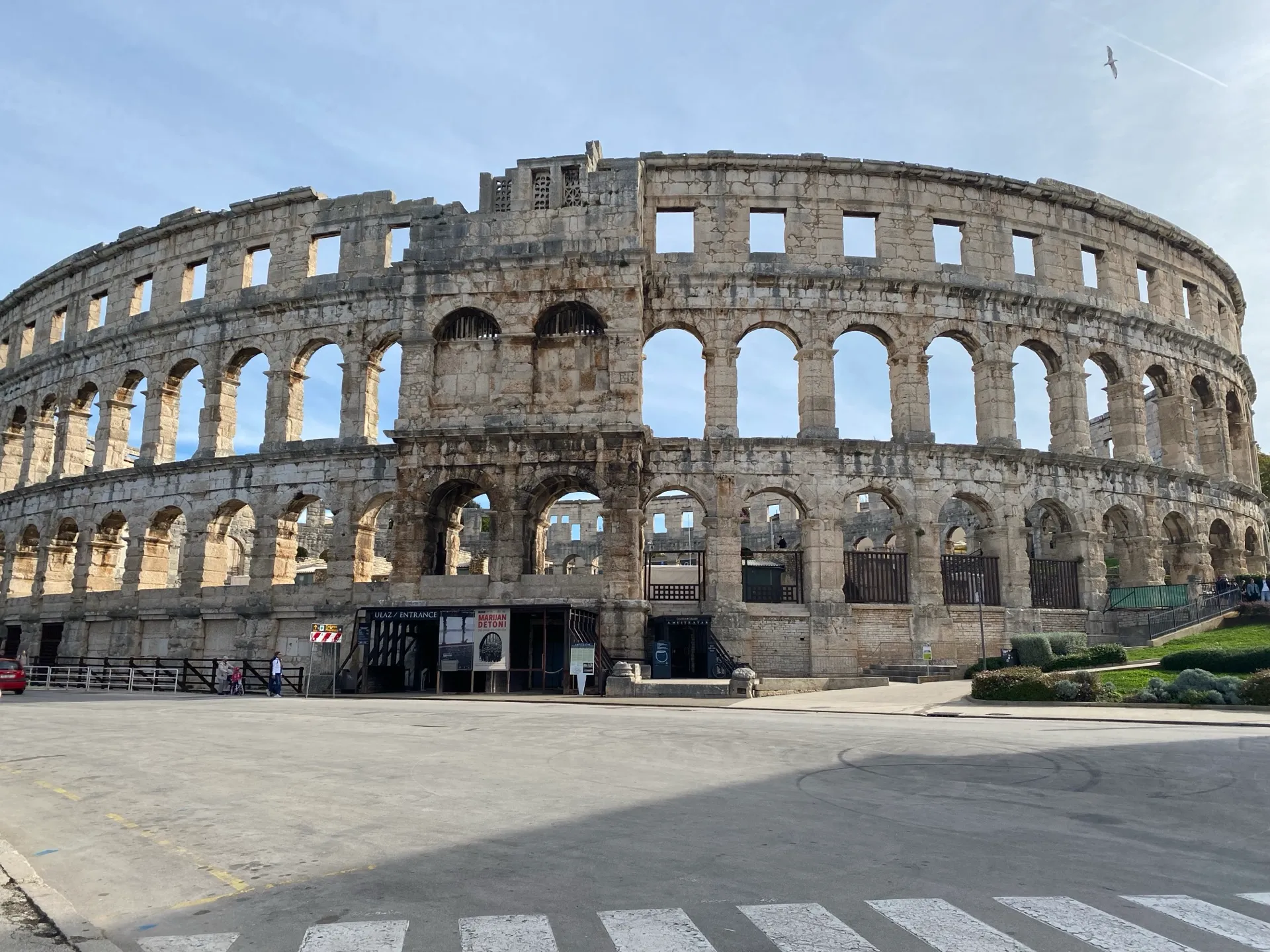 Preserved outer wall and main visitor entrance of Pula Arena