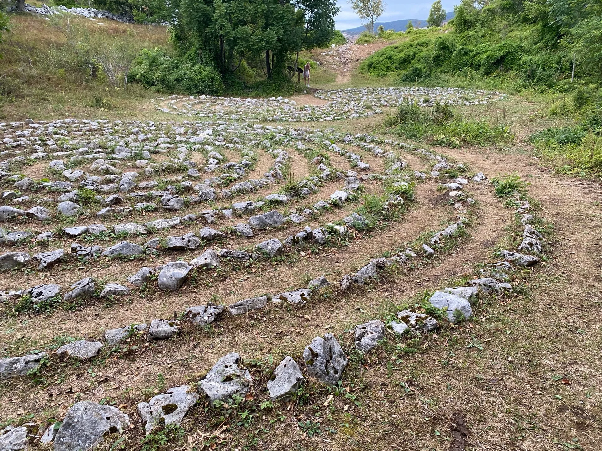Stone path forming one of the final labyrinth patterns